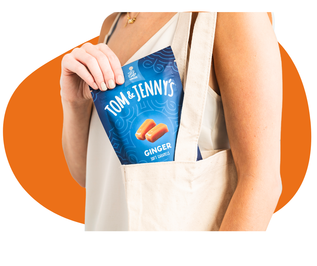 Image of a bag of Ginger caramels being pulled from a tote bag