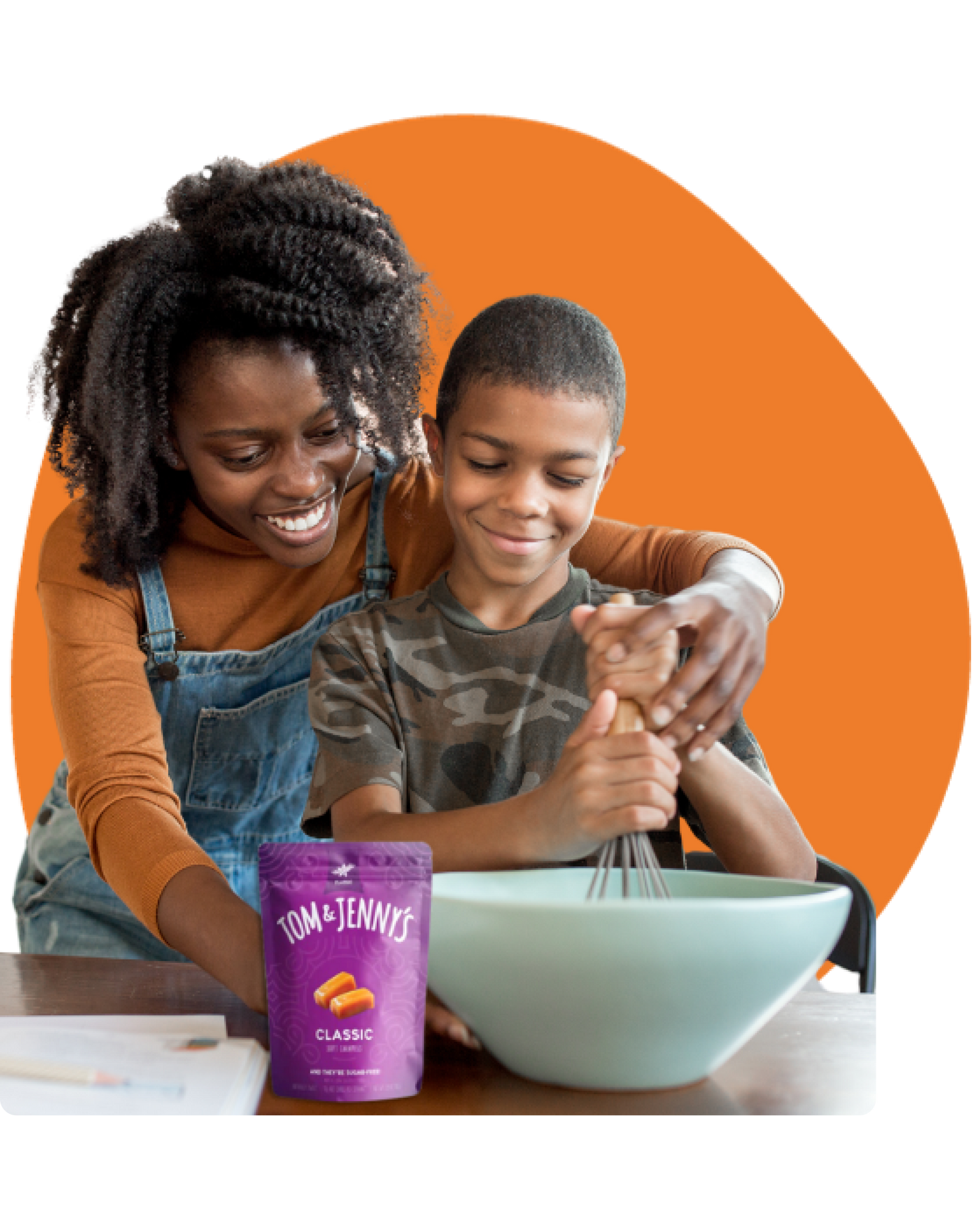 mother and son, smiling, mixing tom and jenny's classic caramel into something delicious