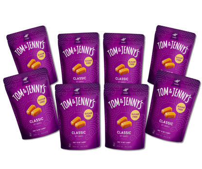 8 packages of Tom & Jenny's classic caramels on a white background