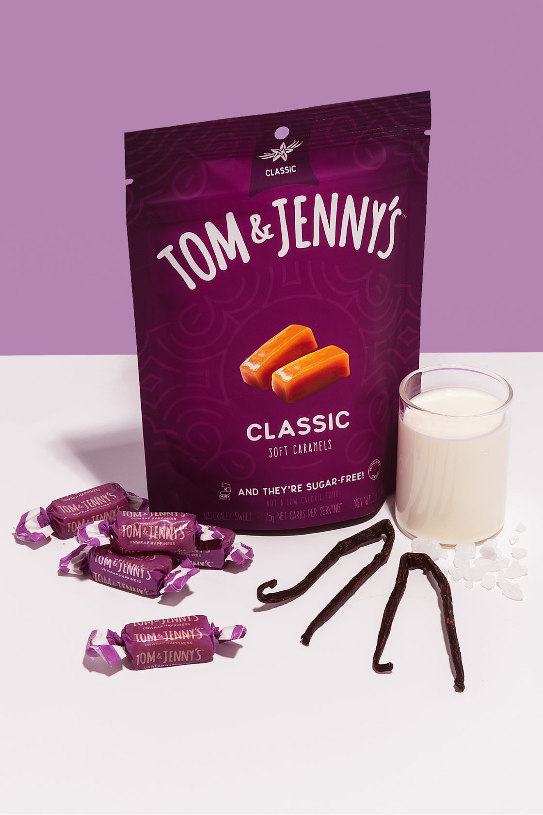 Image of Classic bag of Tom & Jenny's caramels with vanilla and cream and sea salt nearby